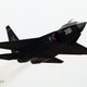 Illustration for article titled Amazing Photos Of Chinas Newest Stealth Jet Show Growing Air Might